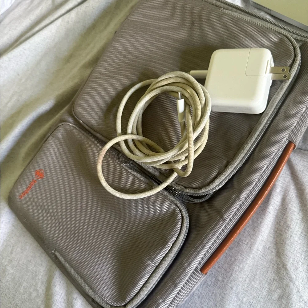 Apple Laptop with Red Logo and Silver Body